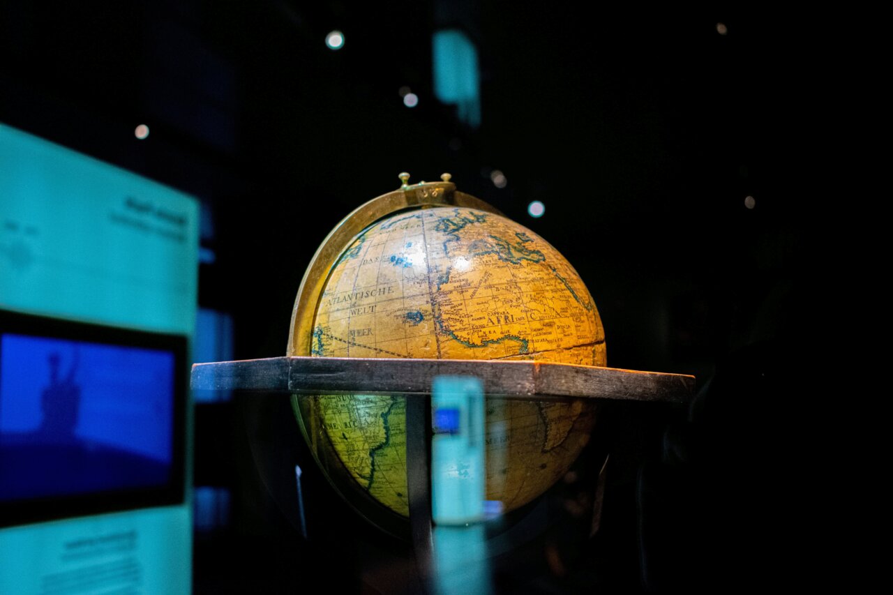 a globus in a dark museum hall